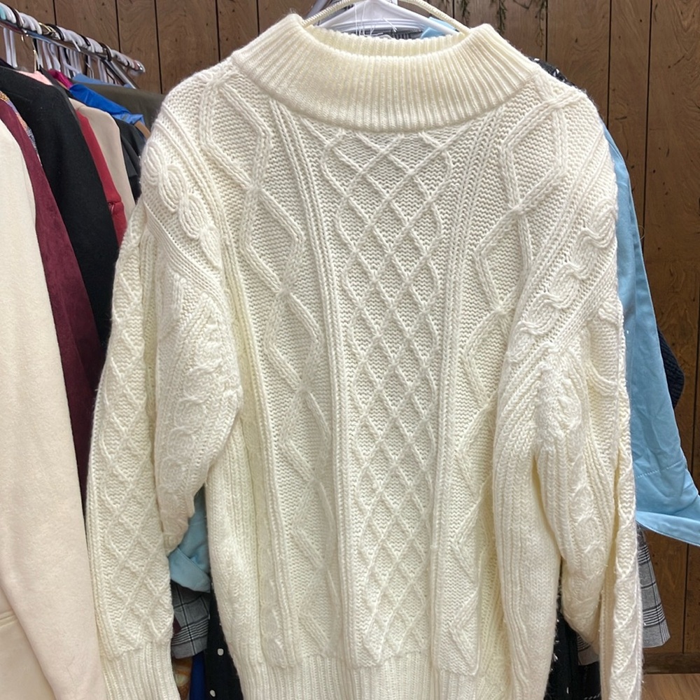 Woman’s sweater.